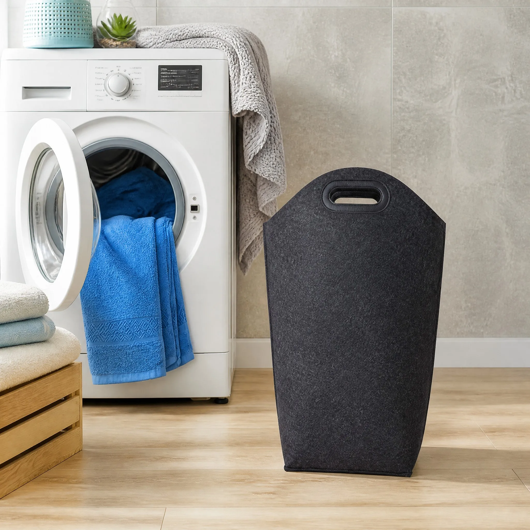 Felt laundry hamper used in a bright laundry room