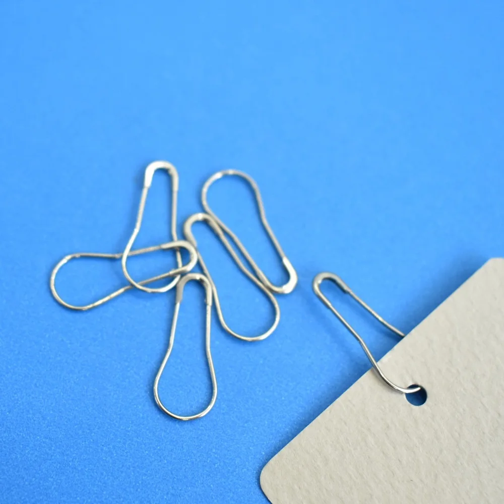Safety Pin Knit Pin Is Not Coiled And Has A Rounded Shape That Is
