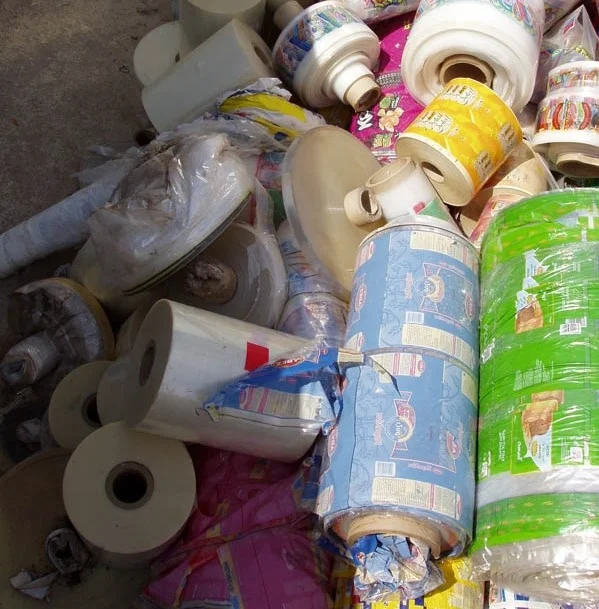 PP - POLYPROPYLENE (BOPP) PLASTIC FILM ROLLS (MIX COLOR) in BIG BAGS SCRAP / WASTE / STOCK for RECYCLING