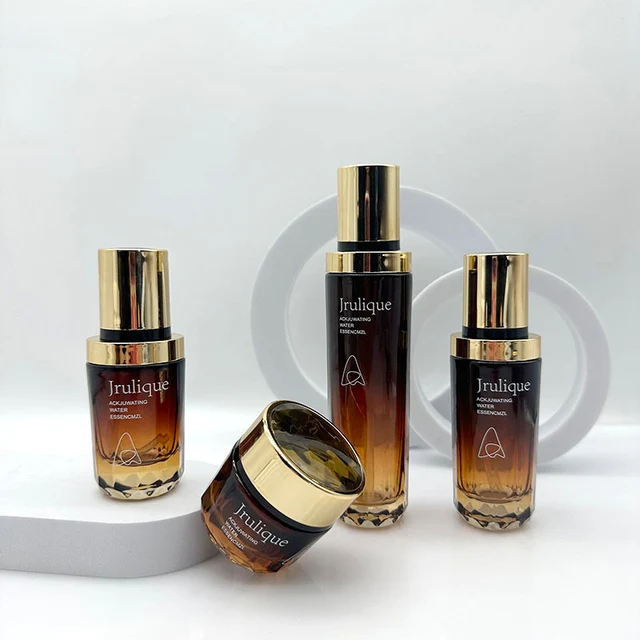 Wholesale Luxury 30m 100ml 120ml Amber Thick Bottom Cosmetic Glass Bottle With Lotion Pump Gold Cap For Cream Lotion Packaging