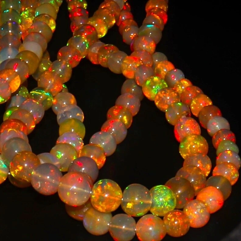 thumbnail interactive-video image 1 of Natural Ethiopian Fire Opal Beads – 7'' Strand, Purple Translucent, 3.5-5mm Round (F3192) 1 of 3