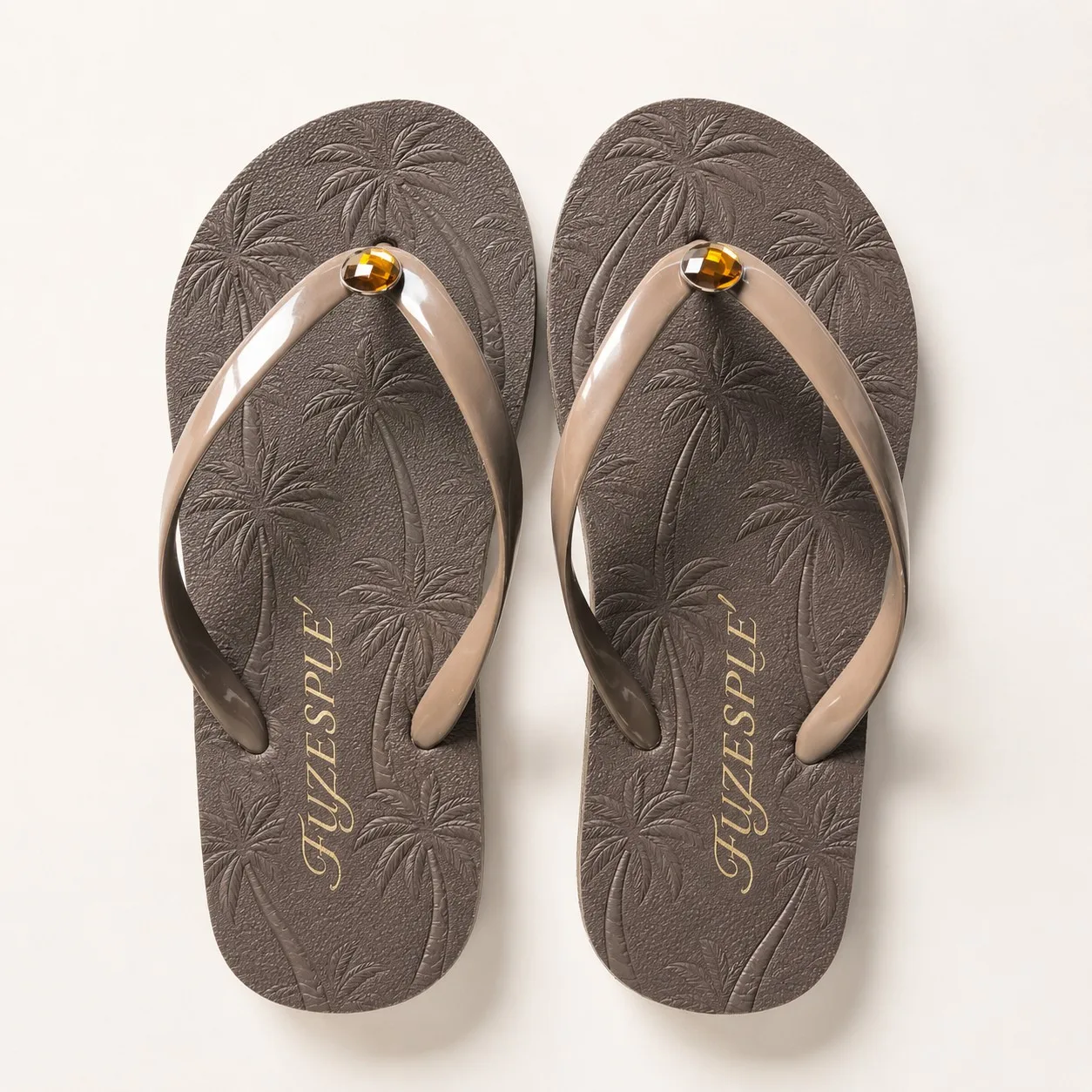 Brown palm tree embossed gem flip flops