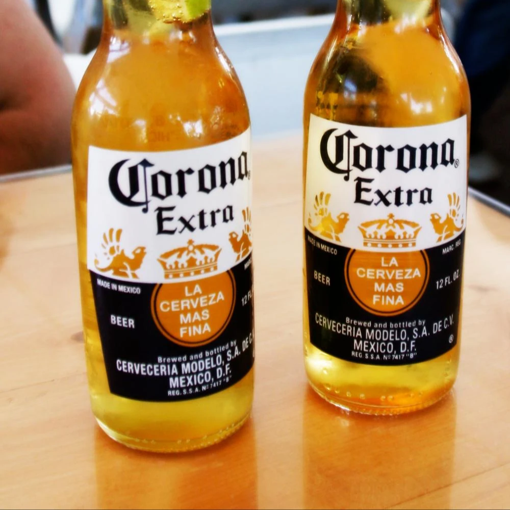Как пить пиво корона. Пиво Corona Extra (Beer Corona Extra. Corona Extra 710 мл. Corona Extra пиво 0,5. Мексиканское пиво корона Экстра.