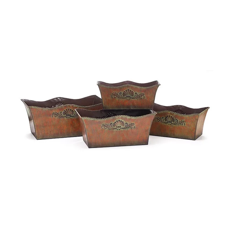 Set of 4 Embosed Metal Nested Tin Planters Accented With Medallion in the Center Each Planter Has Side Ring Handles in Wholesale