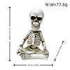Flat sitting skeleton little devil
