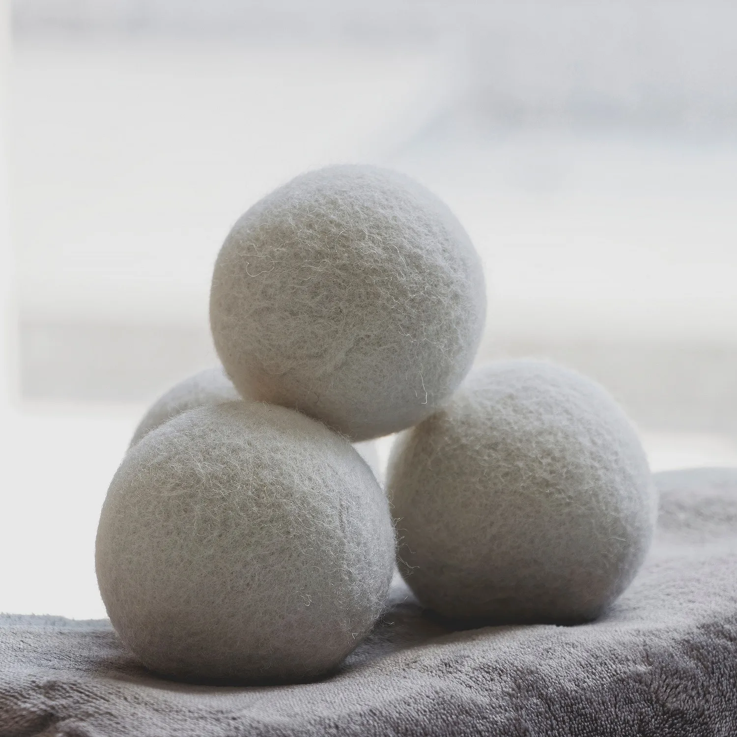 Stack of 4 Wool Dryer Balls Showcase