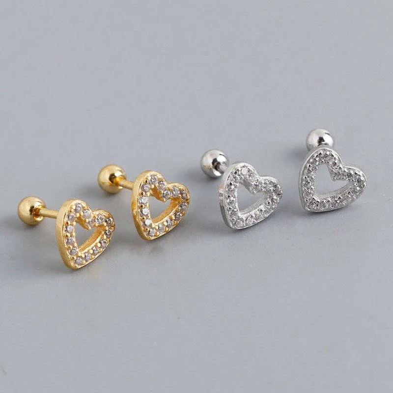 Gold-tone and silver-tone heart earrings featured in the customer case