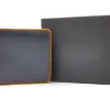Bleu foncé avec surpiqûres beige