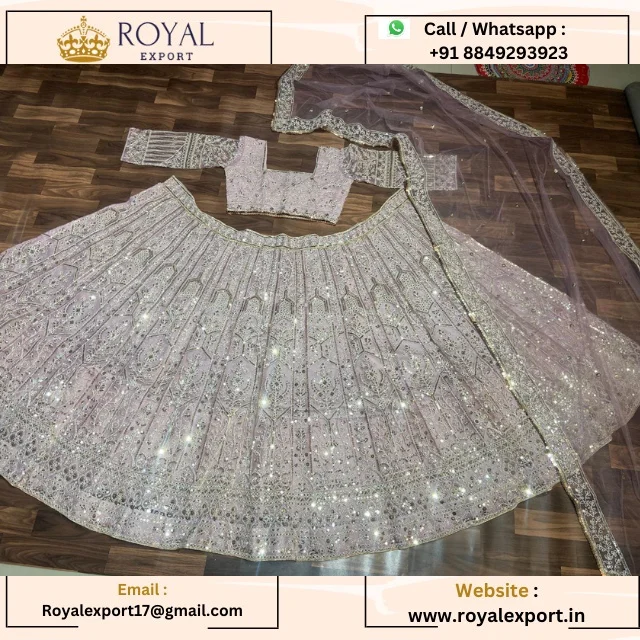 Premium Net Embellished With Beautiful Thread Embroidery and Heavy Sequence Work Lehenga