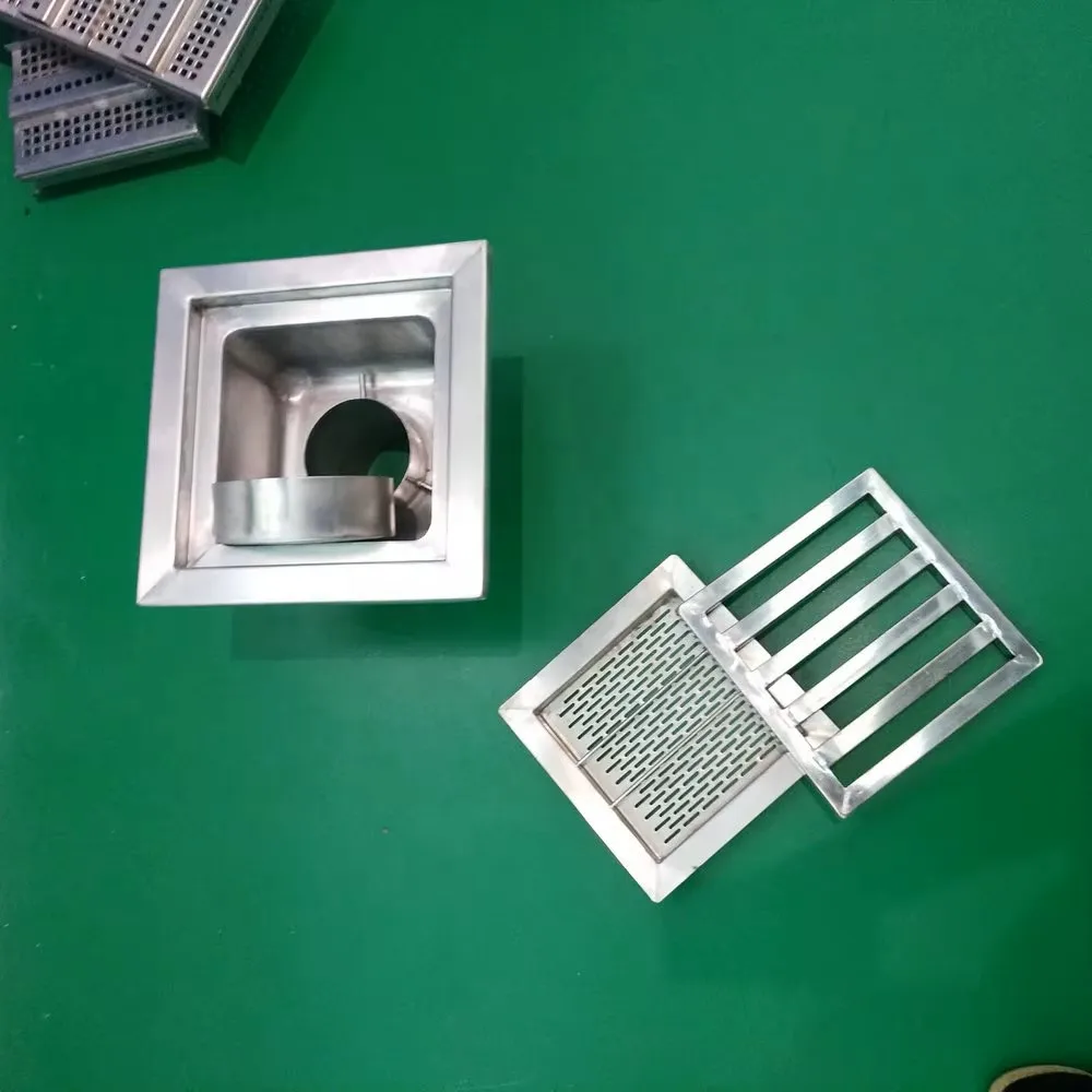 Hygienic stainless steel drainage system with removable filter for the food industry and clean rooms