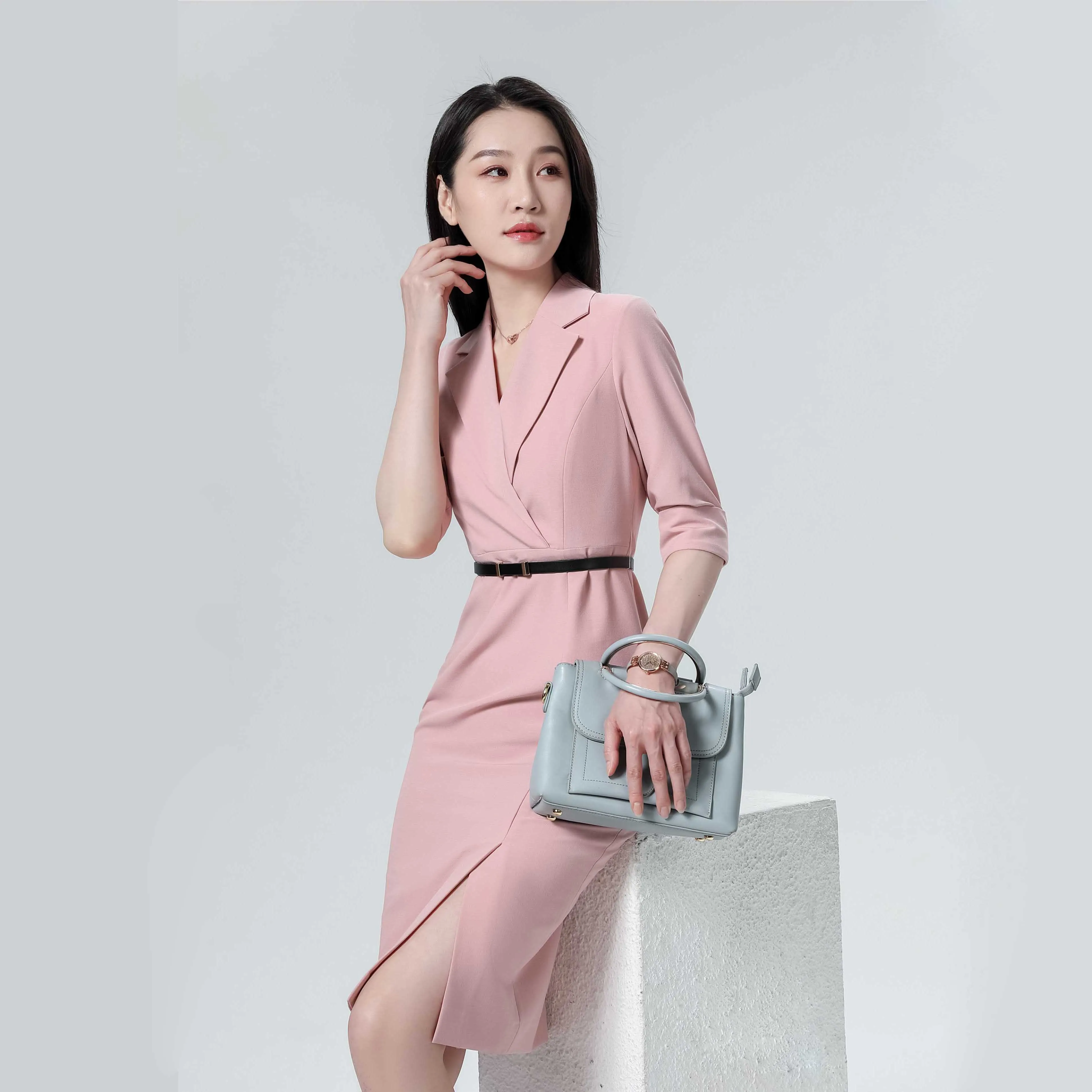 classic tailored dresses Can you own too many classic white dresses? Not if they're all as chic as this tailored midi. Suki's slender shape, ruffled hem, and pretty adjustable tie back makes her a must-have