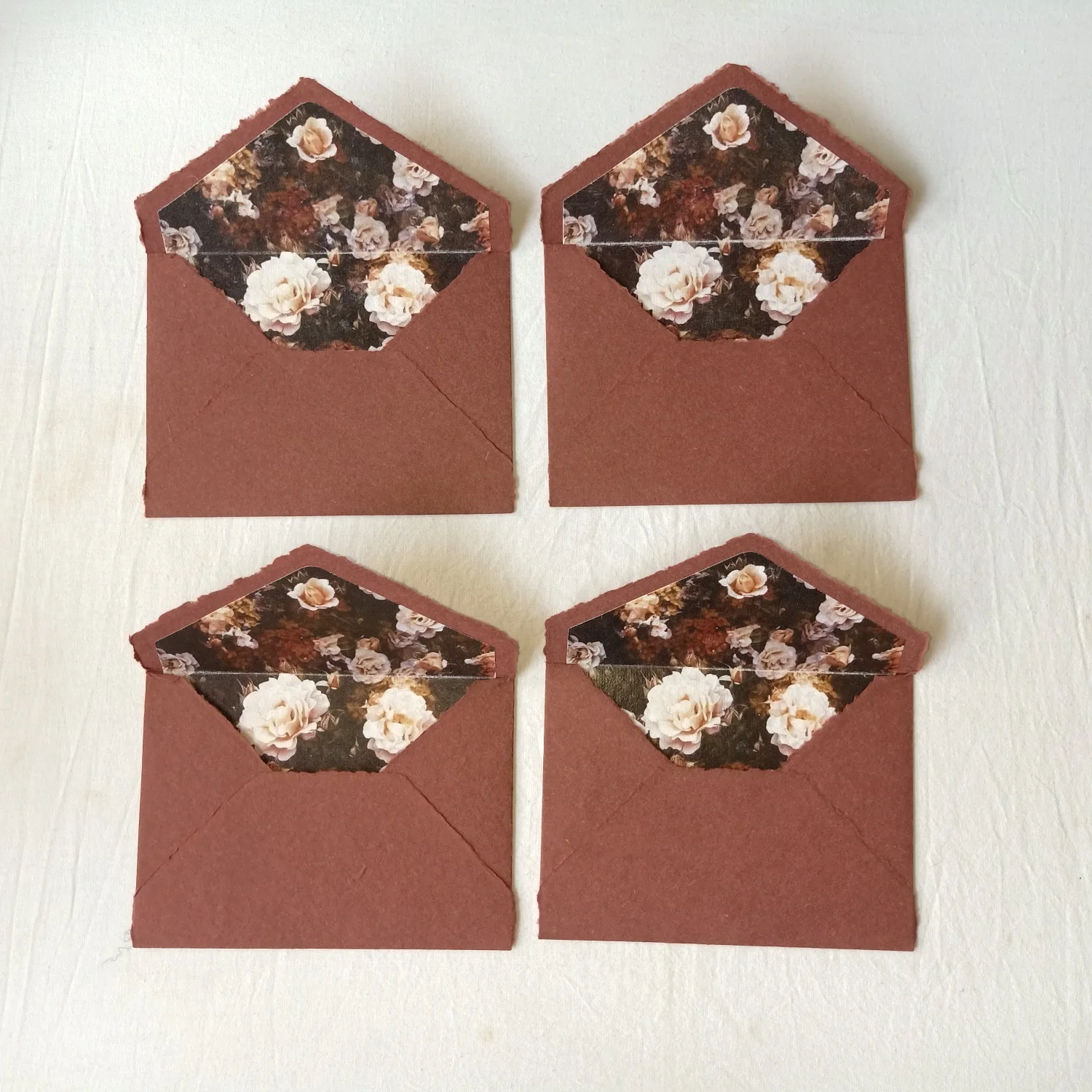 Custom Made Deckle Edged Paper Envelopes with Citrus Themed Liner Suitable for Wedding Stationers