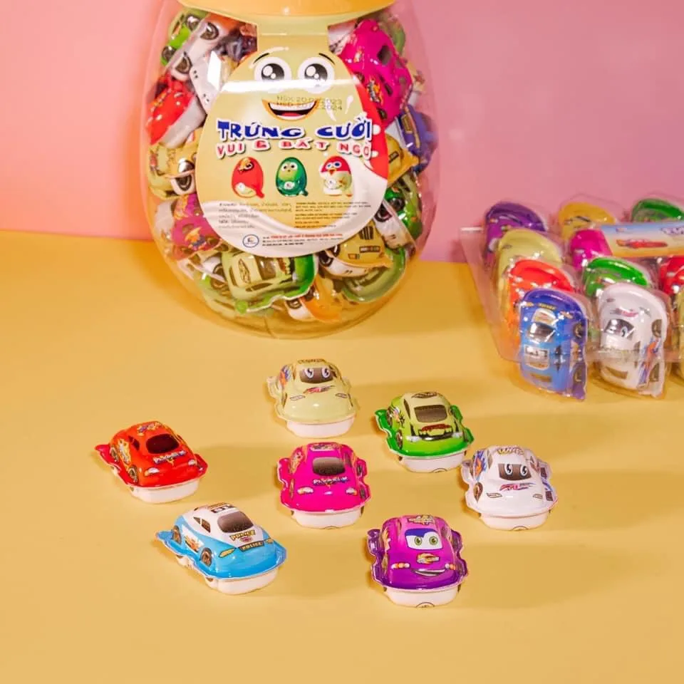 Funny Cartoon Egg-shaped Chocolate Candies And Toy Cars Have A Light ...