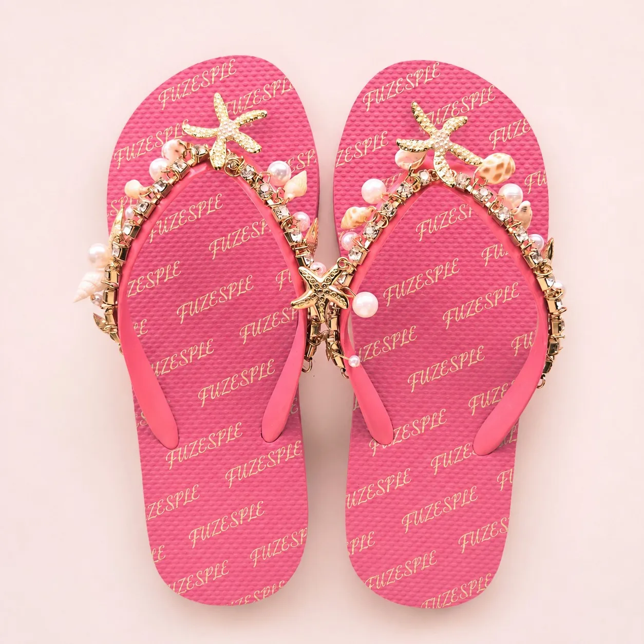 Pink custom starfish shell flip flops with PVC straps
