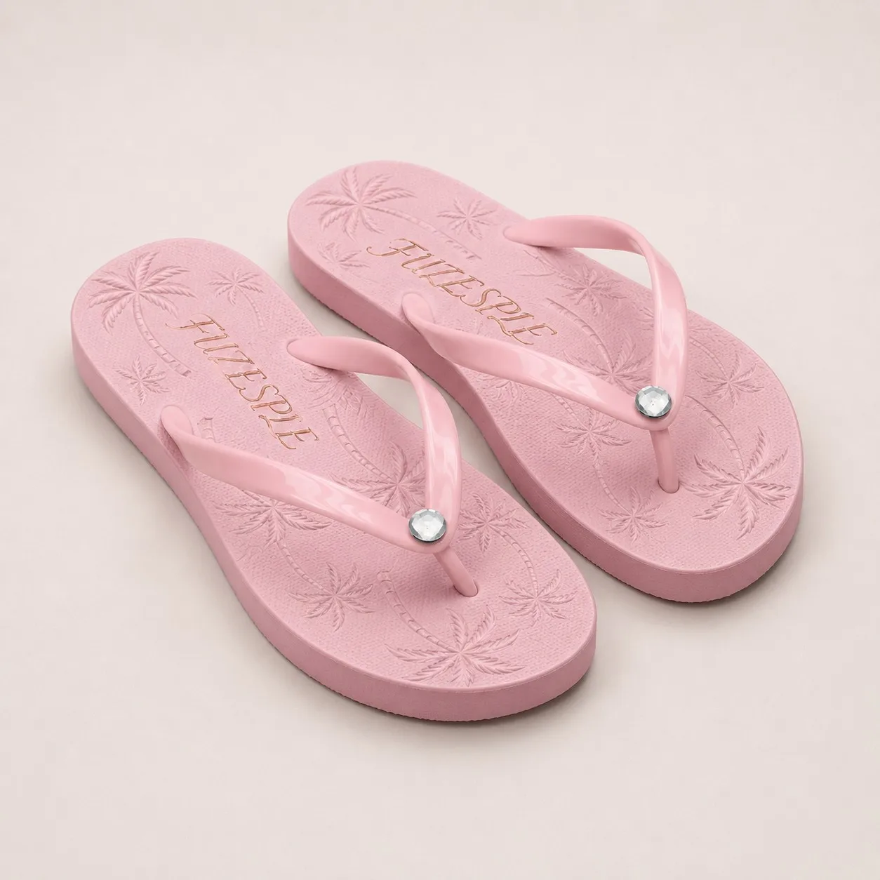 Angled view pink palm tree gem flip flops