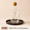Bouteille transparente 1000 ml avec bouchon à bille en liège