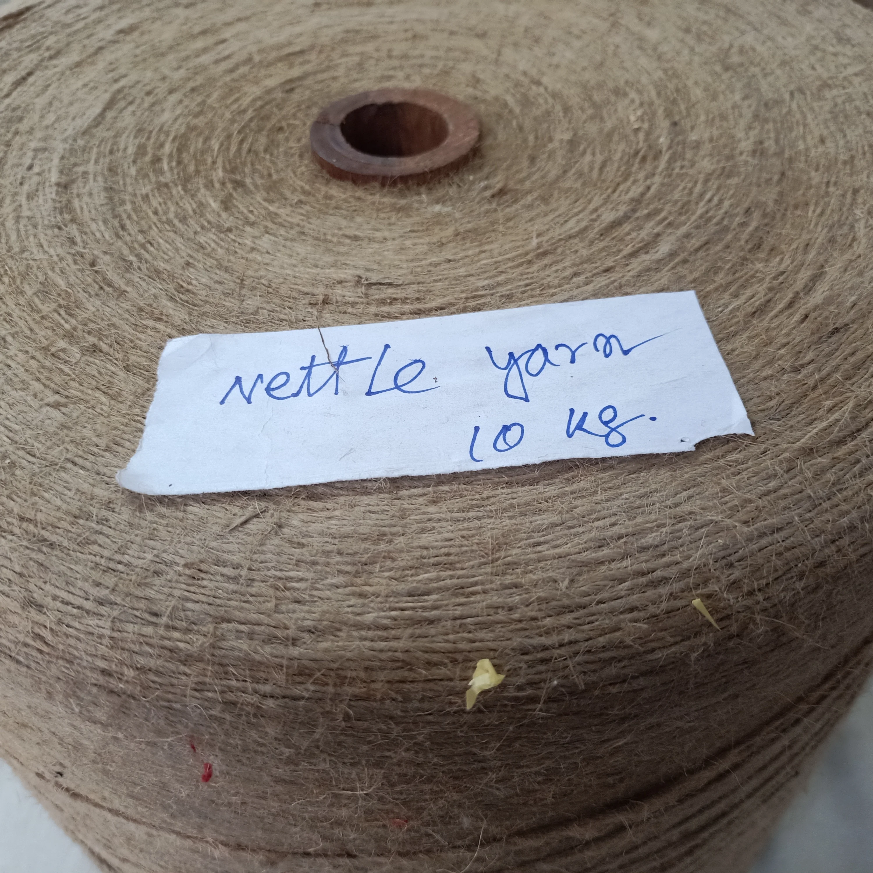 Large Sized Cones of Natural Nettle Fiber Yarns Poy Fdy Filament for Textile Spinning and Weaving Resale Purpose