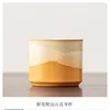 Tazza senza manico arancione sfumato