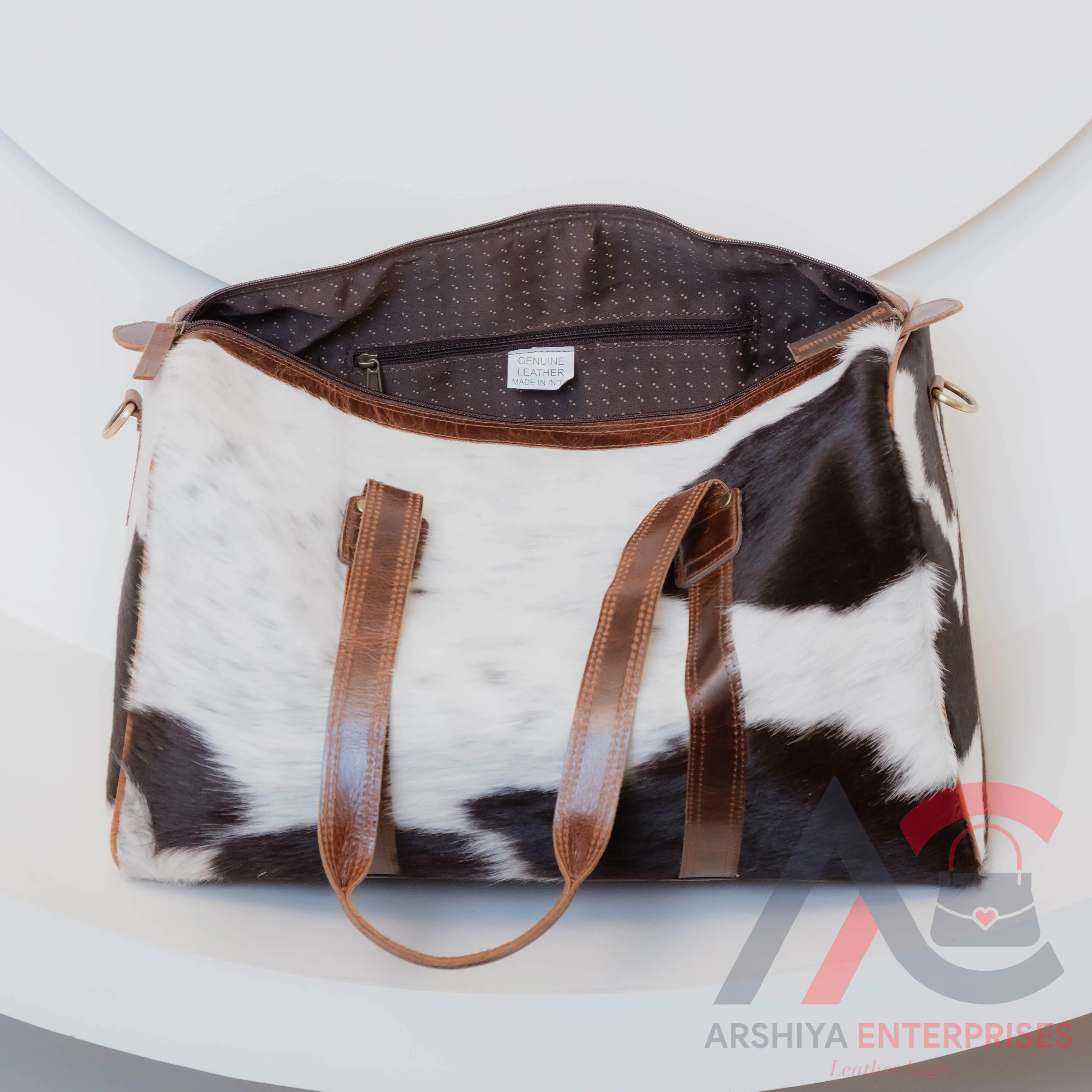 Travel in Style with Arshiya Enterprises Cowhide Duffle Bag