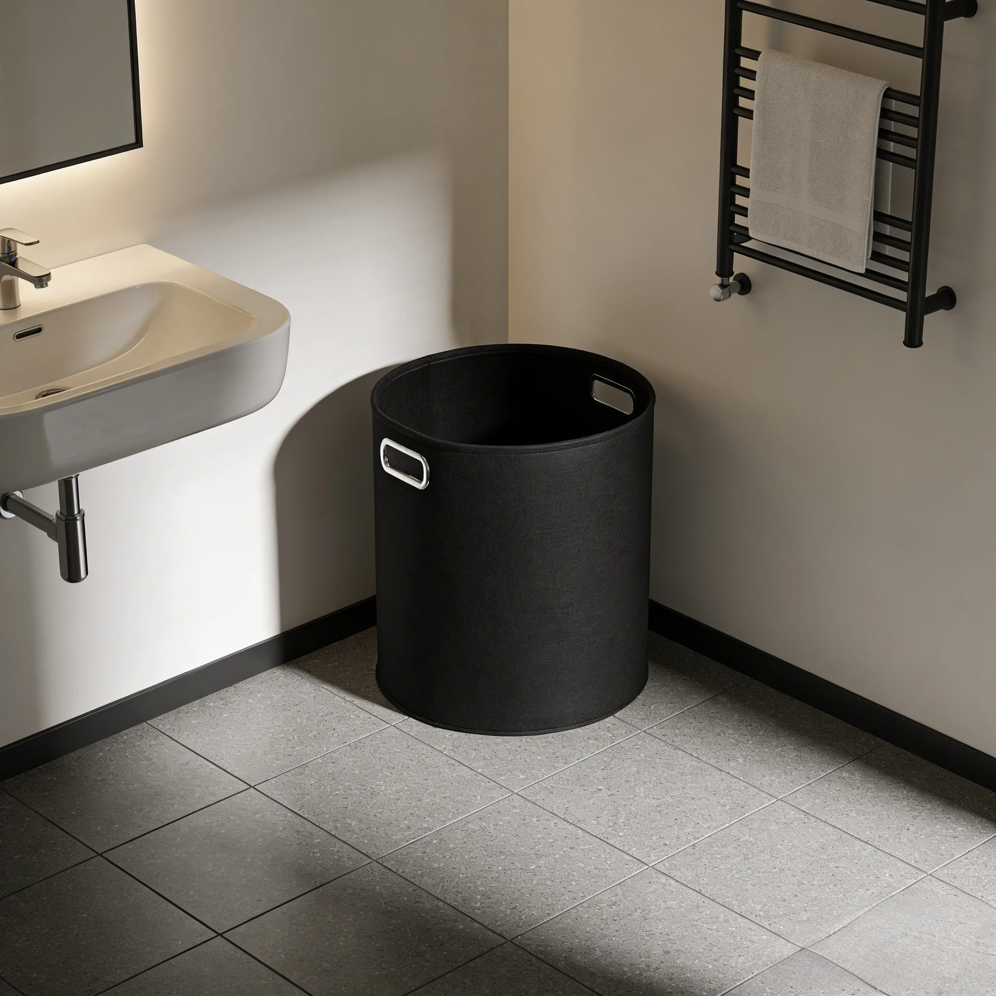 Black felt laundry basket used in a modern bathroom
