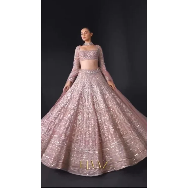 Premium Net Embellished With Beautiful Thread Embroidery and Heavy Sequence Work Lehenga