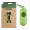 20 rolls of dark green printed garbage bags + 1 pill dispenser