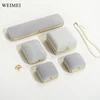 Gray set box with gold line