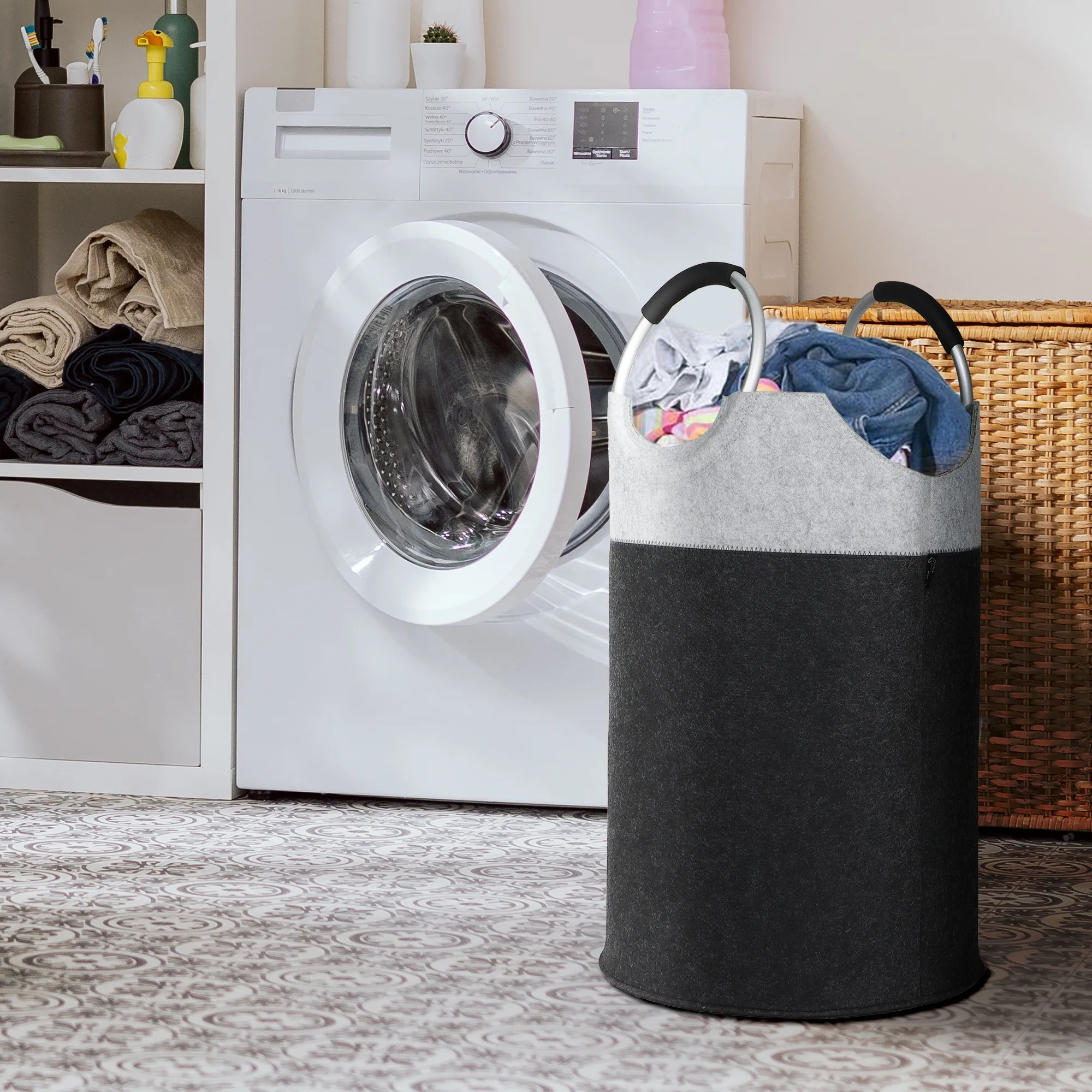 Felt laundry hamper beside a washing machine in a laundry room