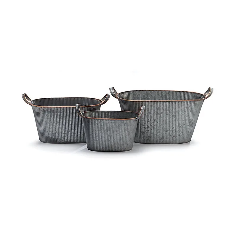 Set of 4 Embosed Metal Nested Tin Planters Accented With Medallion in the Center Each Planter Has Side Ring Handles in Wholesale