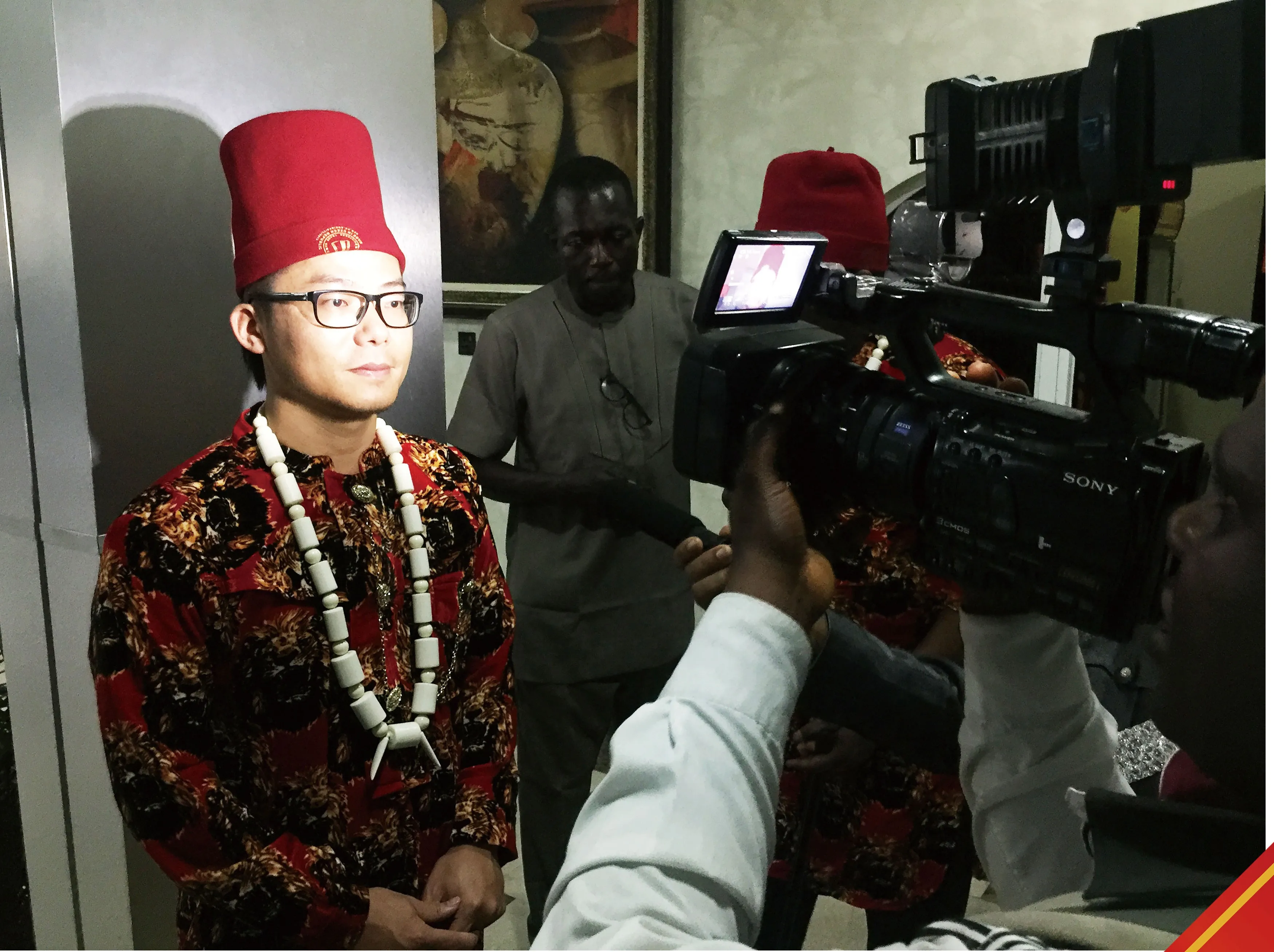 Chief Guo Song interviewed by television media during the official Nigerian chieftaincy coronation