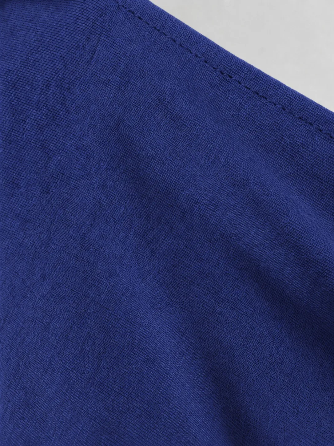 Wholesale cotton jersey hijabs — flat-lay showing fabric surface texture and soft hand feel