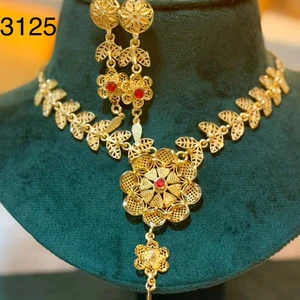24 carat Elegant gold necklace and earring set with Pear Shaped intricate design.