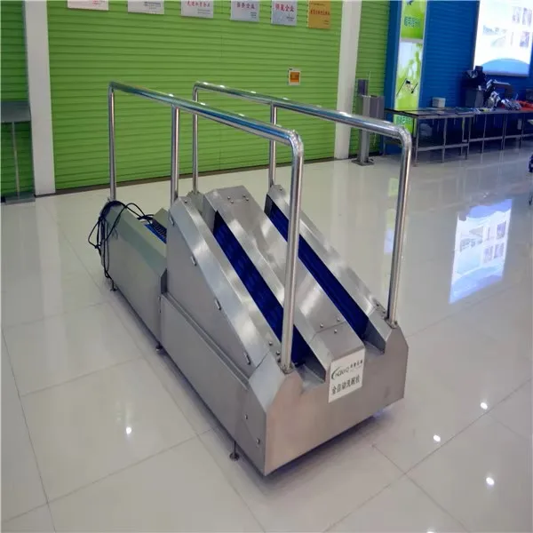 Stainless steel handheld boot washing machine designed to industrial hygiene standards