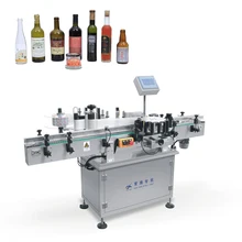 Automatic high capacity outputs label machine for round bottle wine bottle labeling machine for glass bottles XT-100B