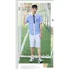 Men's blue shirt and white shorts