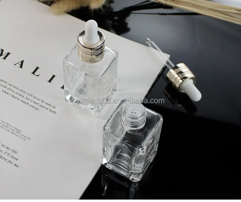 Essential oil glass bottle Same style EsteL Square Serum glass bottle Luxury Square cosmetic packaging Dropper Bottle factory