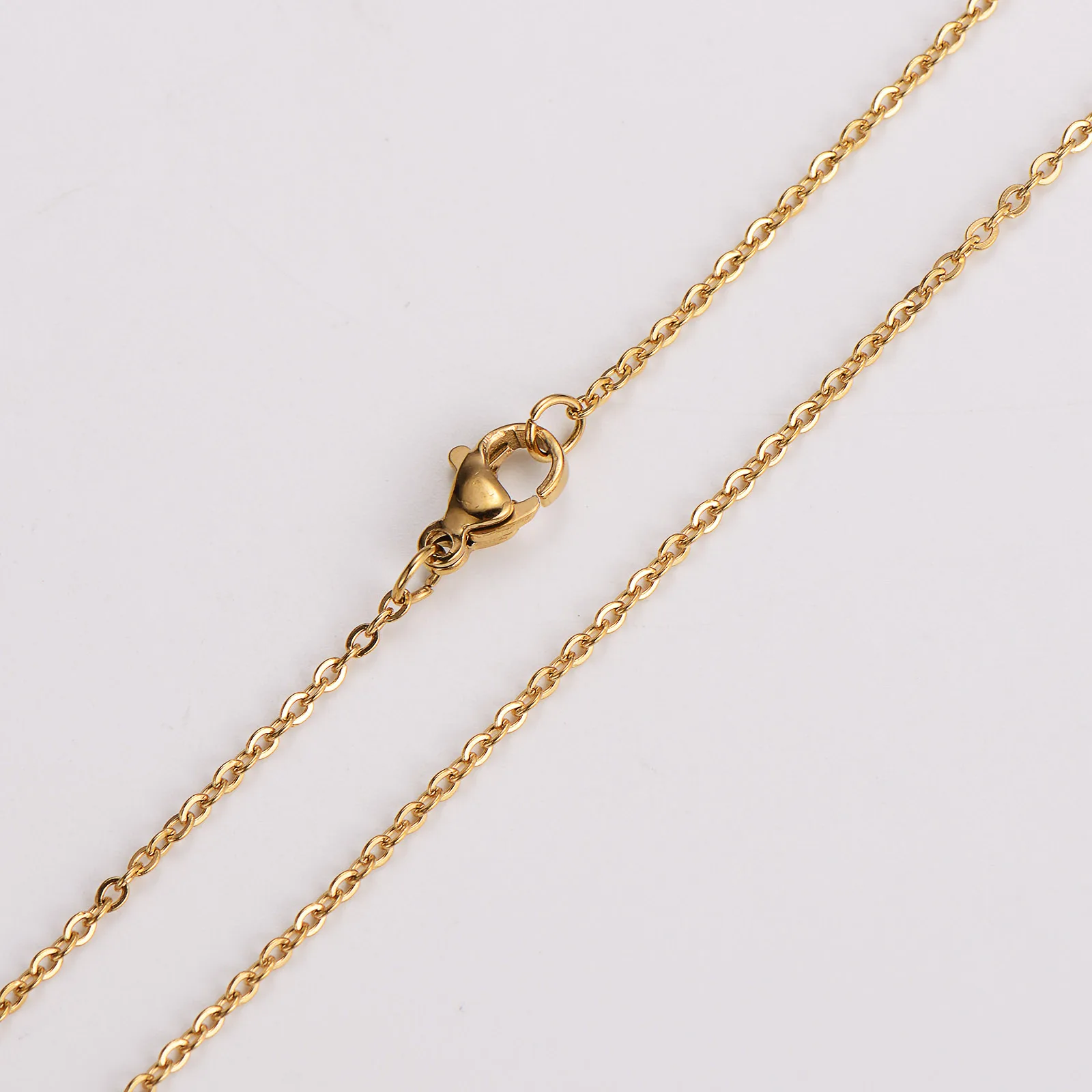 Collana con pendente in oro bianco 18 kt con pietre colorate