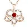 Collana in oro rosa con diamanti rossi