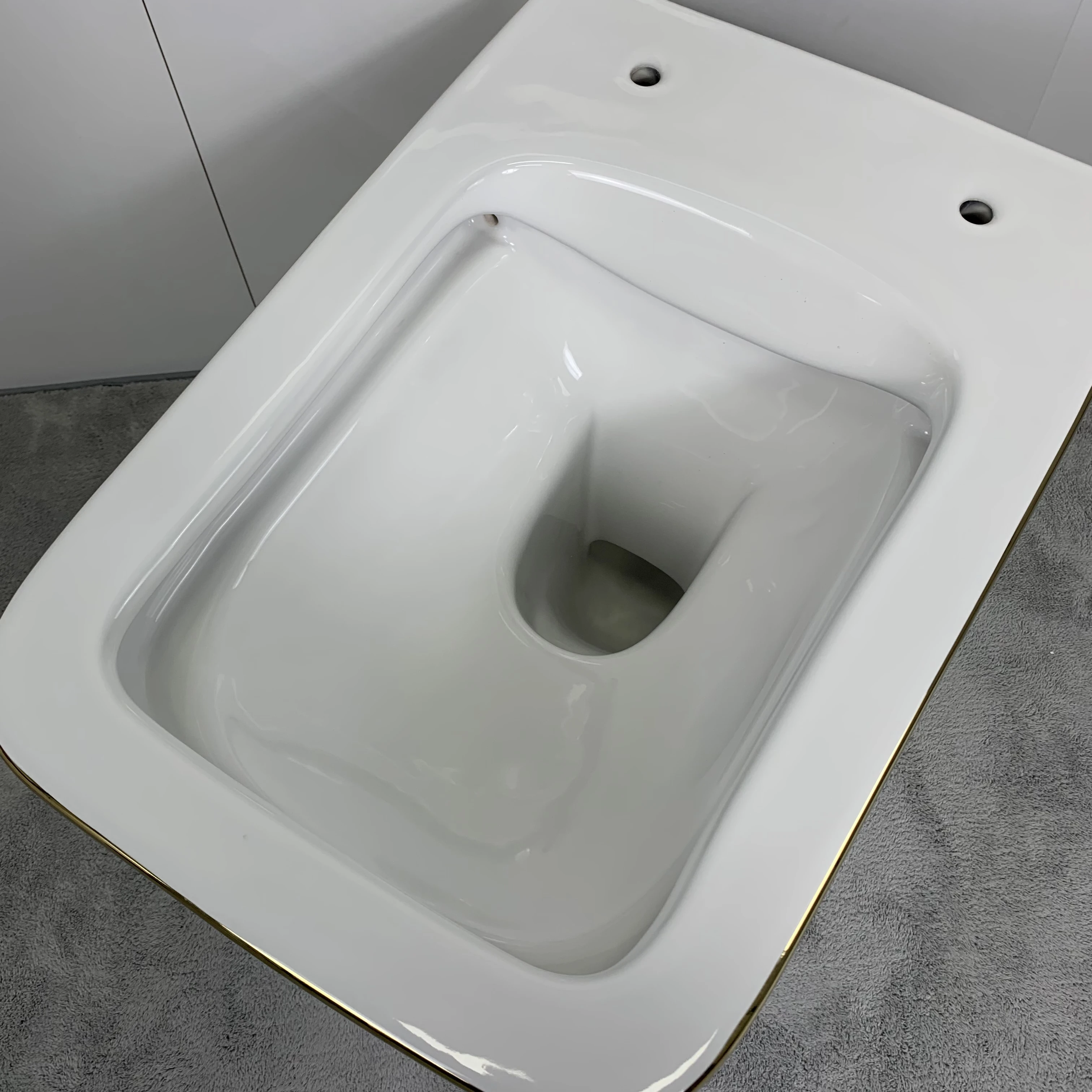 Ceramic luxury design sanitary ware european wall hung wc bathroom suites gold plating bidet toilet set factory