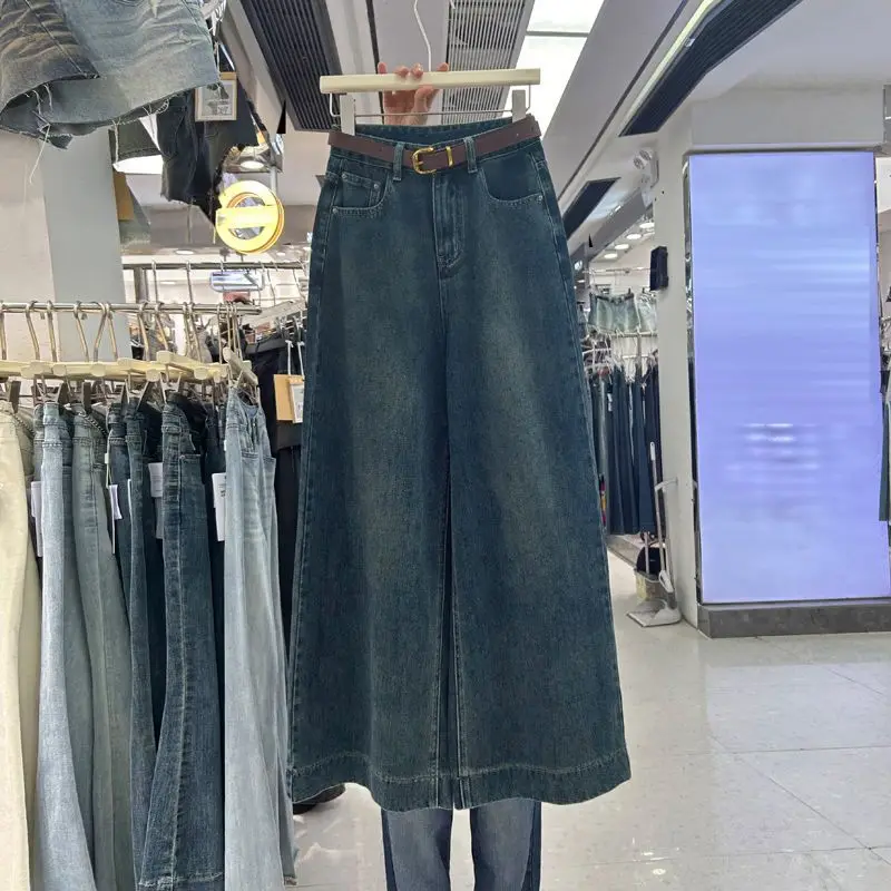 ブルーのビンテージ風フレアワイドレッグ、ハイウエスト、ルーズフィット女性用デニムジーンズ、速乾サンドウォッシュ加工、秋向けフロアレングス