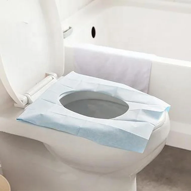 Одноразовый бумажный чехол на сиденье унитаза для общественных уборных