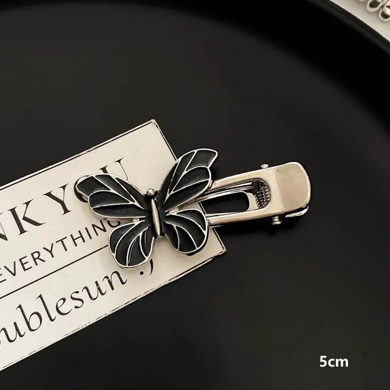 Заколки для волос с цветами и бабочками