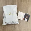 White mailing bag
