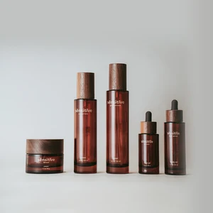 High-end Customized Walnut Lid Glass Bottle Set Dark Wood Lid Cream Jar Personalized Custom Glass Packaging