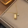 Zircone a forma di lingotto d'oro a doppia faccia