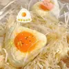 Bola de arroz con yema de huevo