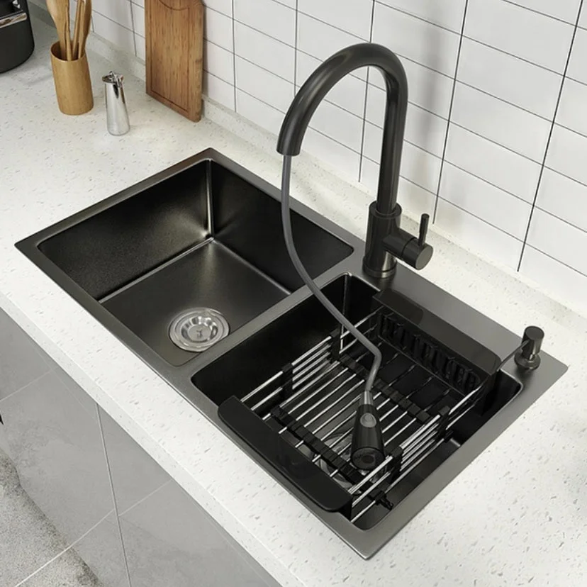 Black double-bowl sink installed in a white countertop
