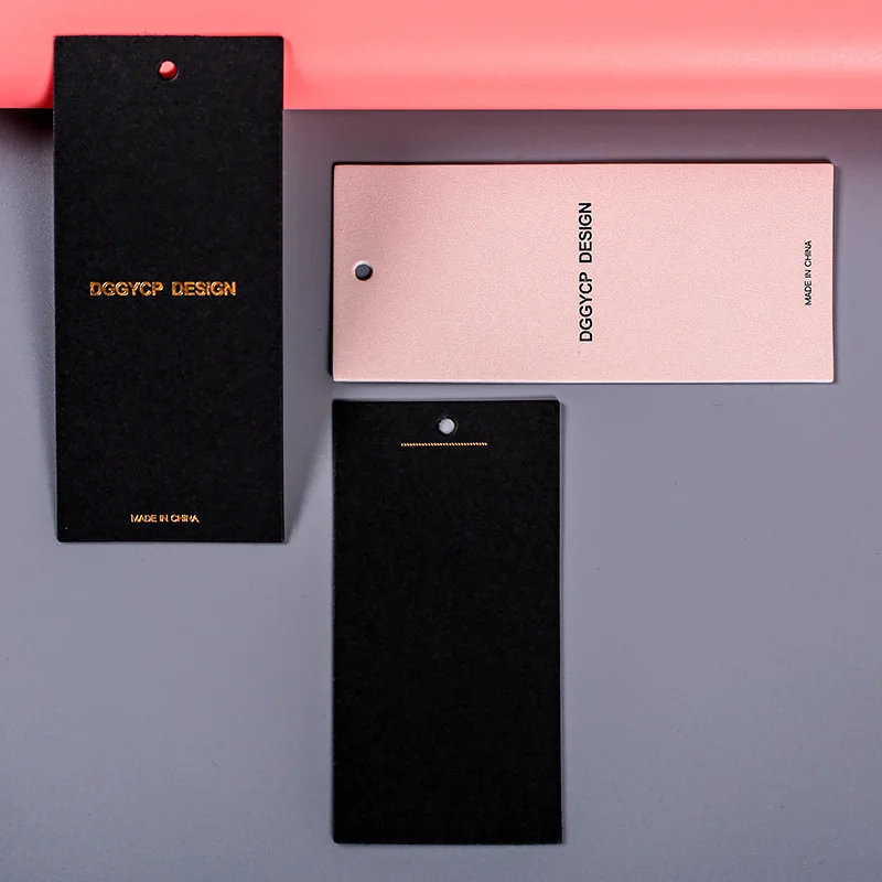 High Quality Custom Cloth Tags Wholesale Gold Embossed Hang Tag Garment Labels with Printed Name Logo