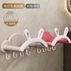 Dos soportes para lavabo con orejas de conejo [gris y rosa]