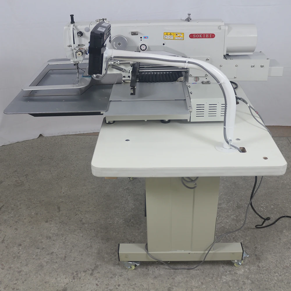 Programmable Sewing Machine Sews Small Square Tags Onto Nylon bing